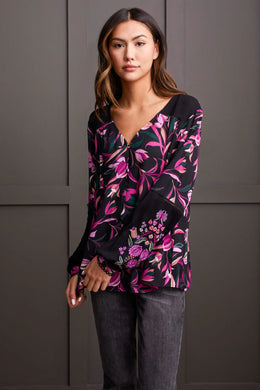 Radiate confidence both inside and out with this vibrantly patterned blouse, featuring a flowing fit that flatters and provides comfort. Distinctive touches such as ladder stitching on the yoke and the embroidered long sleeves distinguish it from the ordinary. Stand out in a crowd with this eye-catching style.