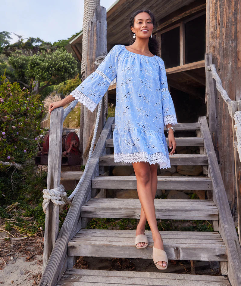 Our Ellie Embroidered Mixed Lace Dress features a romantic, billowy eyelit floral design with intricate embroider. Featuring a luxurious, figure-flattering silhouette, this dress offers a timeless look with modern styling. Perfect for any occasion, it will be sure to turn heads.  Color- Chambray. Scalloped hem. Eyelit floral design. Lace inset. Fabric- 42% Polyester. 38% Rayon. 20% Linen.