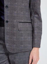 Load image into Gallery viewer, Closeup picture of the left front pocket of the plaid blazer.
