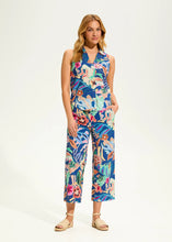 Load image into Gallery viewer, Step into comfort and flair with these contrasting floral pull-on pants. Designed for effortless style, these wide-leg cropped pants feature eyelet detailing and a vivid camo floral print, making them a standout piece in any wardrobe.
