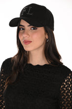 Load image into Gallery viewer, A woman wearing a black baseball cap with 'FL' embellished with silver embellishments on the front, paired with a black lace top, against a plain white background.
