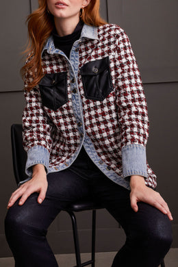 The Fantasia Shacket offers a chic update to your autumn collection. Showcasing a classic plaid design in a striking mix of red, black, and white, it boasts eye-catching accents with denim cuffs and collar, along with faux leather pockets secured by fancy buttons. Ideal for the brisk weather, this shacket promises to keep you warm and fashionable.