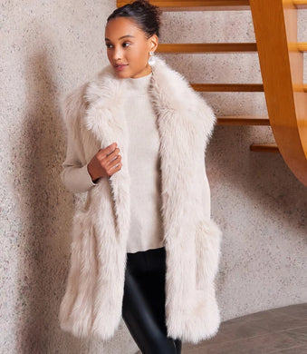 This Faux Fur Vest is ideal for chilly weather, providing a soft and spacious fit perfect for layering. The oversized design ensures both comfort and fashion, making it a versatile addition to your wardrobe for an evening out or a holiday getaway.