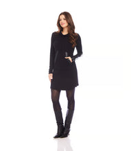 Load image into Gallery viewer, Enhance your clothing collection with our Faux Leather Patch Dress. It features a cowl neck for an elegant flair, and the faux leather accents on the sleeve and pocket provide a contemporary twist. Crafted from soft sweater fabric, this dress offers both fashion and comfort, making it ideal for various events.
