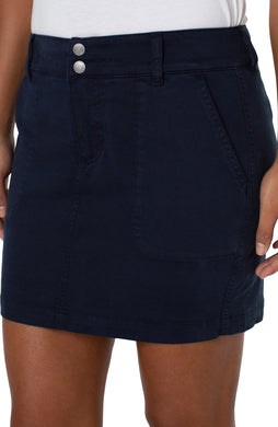 Introducing the new skort by Liverpool Los Angeles! Enjoy the look of a skirt with great coverage thanks to the comfortable spandex shorts underneath.  Comfortable and easy to wear, this skort gives you a cool, utility look.  The federal navy color makes this skort a perfect style to wear with so many of your favorite tops!  Color - Federal Navy - Navy. Skirt: 17