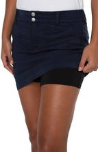 Load image into Gallery viewer, Introducing the new skort by Liverpool Los Angeles! Enjoy the look of a skirt with great coverage thanks to the comfortable spandex shorts underneath.  Comfortable and easy to wear, this skort gives you a cool, utility look.  The federal navy color makes this skort a perfect style to wear with so many of your favorite tops!  Color - Federal Navy - Navy. Skirt: 17&quot; Center Front Length. Short: 5&#39;&#39; Inseam. 7-5/8&quot; Front rise; 17-1/2&quot; Leg opening.
