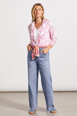 Add a dash of fresh floral fun to your wardrobe with this long-sleeve button-up featuring a border print on its lower half. High slits, an elegant bal collar, and stretch-infused fabric make this a winning choice. Wear long, closed or open or tied at the waist.