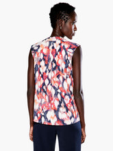 Load image into Gallery viewer, A pattern inspired by the garden in bloom, throw on this tank in our fan favorite Live In fabric and your look will blossom too. With a band collar and raglan sleeve details that add some sophisticated shape to the bright look, this top is the garden party you can wear. The hem falls slightly below the hip and we&#39;ve added a touch of stretch to keep you extra comfortable.  Color-Blue Multi.

