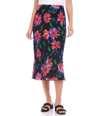 A vibrant floral print enhances the romantic charm of this swingy bias cut skirt in a stylish midi length. It features an easy pull-on silhouette that flows away from the body in streamlined sophistication. Colors- Black, blue, green, pinks. Lined. Bias cut. Elasticized waistband. Fabric- 100% Rayon. Care- Dry clean.