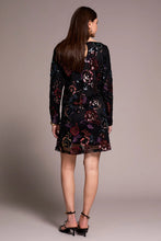 Load image into Gallery viewer, Woman wearing a black and floral sequin dress and black heels against a neutral background.
