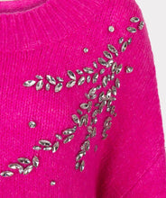 Load image into Gallery viewer, Expertly crafted, the Esqualo Cerise Pink Sweater perfectly combines comfort and sophistication. This oversized, cozy garment is embellished with elegant rhinestones, adding a touch of glamour to any outfit. It will make a statement while keeping you warm. Pair it effortlessly with jeans or skirts for a head-turning look.
