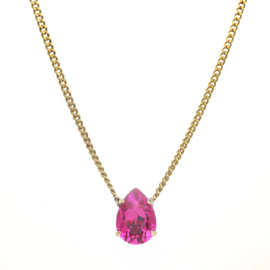 Introducing the Lumi necklace, a dazzling and versatile piece adorned with a high-quality pear-shaped stone in the middle. This antique gold-plated necklace features a 14” length with a 3” extension. Handcrafted in Canada.    Color- Gold and fuchsia. Premium crystals. Tear drop in fuchsia. Gold chain. Length- 14 inches with 3-inch extension. 