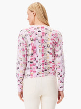 Load image into Gallery viewer, A rosy roadmap print for your season, no matter the season. Whether you&#39;re wearing it with your favorite pair of jeans, to the office, or out on the town, it&#39;s sure to draw the eye thanks to the unique geo print and the fun pleated detail at the top of the sleeves. Lightweight so you can wear it as a top or a layer and Mindfully Made from fully fashioned knitwear that eliminates textile waste.
