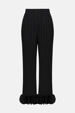 Load image into Gallery viewer, Black pleated pants with circle appliques at the bottom hems against a white background.
