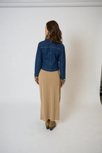 Load image into Gallery viewer, Woman wearing a blue denim jacket with leopard print collar and cuffs, beige pants, and tan boots against a white background.
