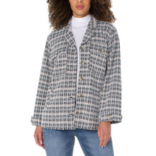 Load image into Gallery viewer, This houndstooth print boxy jacket is effortlessly stylish and comfortable. Pair it with skinny jeans and a form-fitting knit top for an elevated yet casual ensemble.  Color- Grey multi. 28-5/8” HPS. Button front closure, Extended tab closure at cuffs. Flap patch pockets. Slant side pockets.
