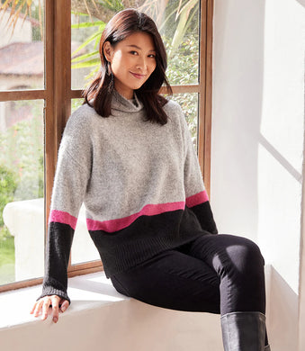 This sweater features a luxuriously soft finish with color-blocked stripes in a timeless turtleneck design. Gray, hot pink and black come together to create a stylish look, perfect for pairing with our Hadley Hot Pink Cropped Vegan Leather Pants - Karen Kane, black trousers, or classic denim. Color- Gray, black and hot pink. Turtleneck. Colorblock detailing. Ribbed detail. Fabric- 53% Recycled Polyester. 38% Acrylic. 7% Wool. 2% Spandex. Dry clean.