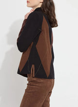 Load image into Gallery viewer, The distinctive Greta Pullover Sweater, made from soft Knit Jacquard, features a sleek funnel neck, shimmering Copper Lurex highlights, side slits with Vegan Suede detailing, and a sophisticated high-low hem. It pairs perfectly with brown or black bottoms for a timeless style, or with denim for a casual vibe.
