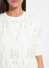 Load image into Gallery viewer, Woman wearing a white knit sweater with rhinestones against a plain background.
