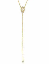 Load image into Gallery viewer, A gold lariat necklace featuring a teardrop-shaped pendant with a central  round moonstone, surrounded by small clear stones, and a long dangling chain ending in a small crystal, shown on a plain white background.
