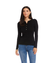 Load image into Gallery viewer, Woman wearing a black ribbed sweater with rhinestone buttons and blue jeans against a white background.
