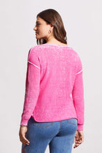 Load image into Gallery viewer, One of our top sellers, this light and adaptable V-neck sweater is a perfect choice for casual, trendy fashion.  Our gorgeous sweater offers a bright pop of pink color, pop-over design and long sleeves with drop shoulders, an exposed center seam, and a high-low hem with side-slit details.  Color - Hi pink. Pop-over v-neck. Long sleeve with drop shoulder Exposed center seam; high-low hem with side slits Special reverse bleach print Fabric - 100% Cotton.
