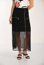 Load image into Gallery viewer, Model wearing a floral top, long black skirt with mesh and black sandals on a white background.
