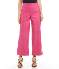 Load image into Gallery viewer, These on-trend, vegan leather trousers in a stylish hot pink hue will update your wardrobe and upgrade your look.   Color- Hot pink. Front rise: 11 3/8 inches (size M) Inseam: 26 1/4 inches (all sizes) Wide-leg. Elasticized waistband. Side zipper. Fabric -Vegan Leather: 50% Viscose. 50% Polyurethane Care- Dry clean.
