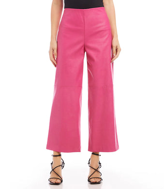 These on-trend, vegan leather trousers in a stylish hot pink hue will update your wardrobe and upgrade your look.   Color- Hot pink. Front rise: 11 3/8 inches (size M) Inseam: 26 1/4 inches (all sizes) Wide-leg. Elasticized waistband. Side zipper. Fabric -Vegan Leather: 50% Viscose. 50% Polyurethane Care- Dry clean.