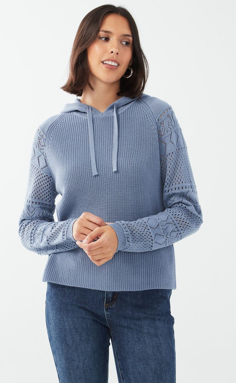 Craft an effortless look with this crochet-knit hooded sweater. Shine in this light blue hue, a perfect addition to your wardrobe.  Color- Indigo blue. Pull on. Hooded. Crochet knit.