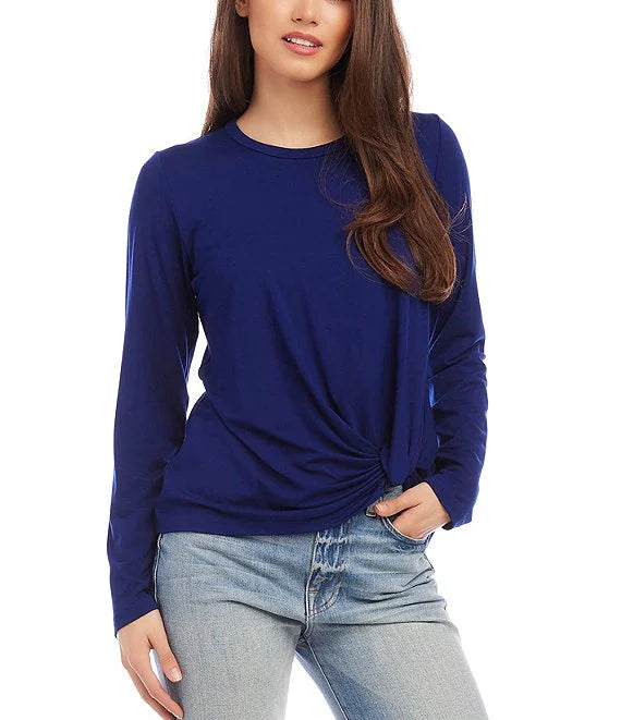 This jersey-knit top is made with buttery fabric that adds gentle motion and features a chic pick-up hem. It is an ideal match for high-waisted jeans.  Color- Iris blue. Length: Right side: 23 5/8 inches (size M) Left side: 21 3/8 inches (size M) Long sleeves. Crew neckline. Pick-up side hem. Fabric- Stretch Jersey: 90% Rayon.10% Spandex.