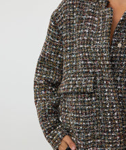 Load image into Gallery viewer, Introducing the EsQualo Tweed Bomber Jacket in black, a stylish and versatile piece featuring a subtle multicolor yarn and lurex. This jacket is the perfect combination of boldness and chic elegance, bringing a unique texture and shimmer to your wardrobe. Dress it up with a skirt or trouser or keep it casual with denim.
