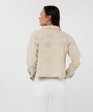 Load image into Gallery viewer, The EsQualo Jacket is a stylish blend of cool and elegant. Featuring frayed edges for a distressed denim look and delicate embroidery for a chic touch. This 100% cotton jacket includes front chest pockets for added functionality.
