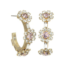 Load image into Gallery viewer, The Julia Earrings boast a dazzling antique gold finish on brass base metal and are expertly adorned with high-grade crystals that sparkle and shine. Crafted in Canada and fitted with hypoallergenic surgical steel posts, these earrings provide an effortless elegance and luxurious comfort for all day wear. Color- Pink, gold and white. High quality Swarovski crystals. Antique gold plated over brass base metal. Surgical steel posts.
