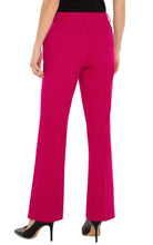 Load image into Gallery viewer, The Kelsey flare trousers elevate our ready-to-wear collection with a refined touch. Crafted from a woven fabric, they offer a lighter alternative to our popular super stretch ponte fabric. Their subtle shine adds a new level of sophistication to our suiting lineup, creating a beautiful drape.
