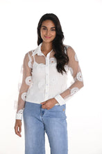 Load image into Gallery viewer, The Frank Lyman Kora Knit Top with Cami is a stylish piece featuring a delicate floral mesh design, adding a touch of romance and sophistication to your wardrobe. The Kora includes a comfortable cami for coverage while maintaining its airy elegance. Perfect for pairing with jeans or skirts, this versatile top transitions seamlessly from casual outings to dressy occasions.
