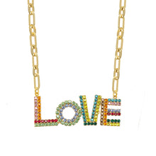 Load image into Gallery viewer, Complete your look with this uniquely charming LA LA LOVE Necklace! Crafted in antique gold-plated brass, this 17&quot; beauty will wow with its high-quality crystals and 3.5&quot; extender. Show your love with this pendant that&#39;s made in Canada.  Color- Gold, red, green, yellow, orange, pink, blue. Premium crystals. Antique gold plating over brass. Length- 17 inches with 3.5 inch extender.
