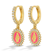 Load image into Gallery viewer, Huggie earrings with pink central stone and gold Virgin Mary surrounded by cubic zirconia against a white background.
