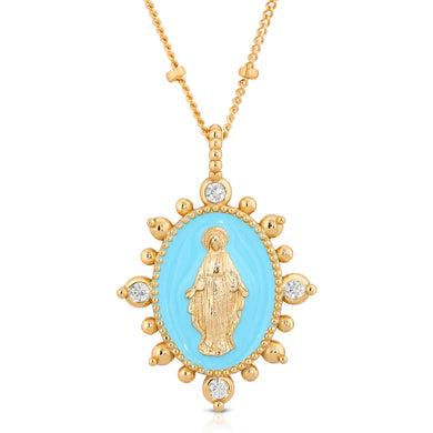 Close-up photo of a gold necklace with aqua enamel pendant with picture of Mother Mary surrounded by crystals against a white background.