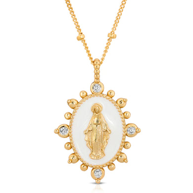 Deepen the faith with the Lady Lourdes Pendant Necklace. Features a white enamel pendant, highlighting a portrait of the Virgin Mary surrounded by ornamental CZ accents and embellished spike details. Perfect pop of color for your daily stack of necklaces.  Color- White and gold. Cubic Zirconia. White Enamel 14K Yellow Gold Plating over Brass. 14
