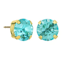 Load image into Gallery viewer, Trentley Light Turquoise Stud Earrings are a fashionable choice for adding a bit of sparkle to your look. Crafted from antique gold-plated brass for a timeless finish, these earrings feature 10mm crystals for added shine. Hypoallergenic and made in Canada, these delightful pieces make for an exquisite addition to any wardrobe.  Color- Gold and light turquoise. Stud design. Premium crystals. Hypoallergenic. Antique gold plating over brass. Diameter- 10mm.
