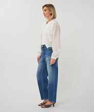 Load image into Gallery viewer, Woman wearing an off-white sheer jacket over a white shirt, blue jeans and animal print sandals on a plain background.
