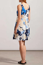 Load image into Gallery viewer, Discover the perfect blend of style and functionality with our Tribal Lined Scoop Neck Tiered Dress with Pockets. This elegant dress features a scoop neckline and a tiered design, adding a touch of sophistication to your look. The sleeveless cut ensures you stay cool and comfortable, while the convenient side-seam pockets provide practicality.
