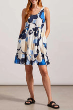 Load image into Gallery viewer, Discover the perfect blend of style and functionality with our Tribal Lined Scoop Neck Tiered Dress with Pockets. This elegant dress features a scoop neckline and a tiered design, adding a touch of sophistication to your look. The sleeveless cut ensures you stay cool and comfortable, while the convenient side-seam pockets provide practicality.
