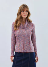 Load image into Gallery viewer, Woman wearing a spacedye long-sleeve, turtleneck top and denim skirt against a white background.
