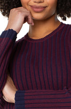 Load image into Gallery viewer, Close-up of a model wearing a burgundy and navy striped sweater.
