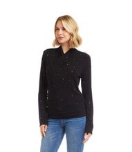 Load image into Gallery viewer, Woman wearing a black long-sleeve crossover top with sparkles and jeans against a white background.
