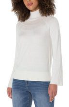 Load image into Gallery viewer, This timeless sweater is a classic blend of style and comfort. Crafted from a luxurious fabric in a porcelain white, with intricate pointelle stitching, it features a funnel neck and bell sleeves. Perfect for layering or wearing solo, it&#39;s a wardrobe essential. Color- Porcelain. Sweater yarn fabrication. Mock neckline. Bell sleeves. Pointelle detailing. Pullover construction.
