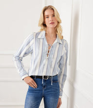 Load image into Gallery viewer, Woman wearing a striped shirt, blue jeans and black belt against a white background.
