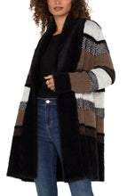 Load image into Gallery viewer, Introducing the Coatigan - the chic combination of a coat and a cardigan. A perfect style that transitions from the outdoors to the indoors, our long sleeve sweater coat features a luxe faux fur shawl collar and a color blocked pattern.&nbsp; This coatigan pairs well with denim, trousers or leggings!
